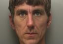Michael Davis, 39, is wanted by Surrey Police