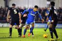 Opener: Lyle Taylor edged AFC Wimbledon ahead in the League Two play-off final before Adebayo Akinfenwa's penalty sealed a 2-0 win