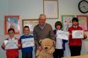 Winners of poster competition Jess Watts, Joshua Edwards, Cllr Tony Brett Young, Aaron Roberts and Charmane Nelson