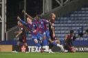 In top form: Wilfried Zaha celebrates his goal against Middlesbrough