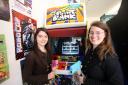 Sophia Start and Sarah Buck try out the games in store.