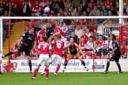 Under the cosh: Brentford defend against Rotherham on Saturday. Gary Paul