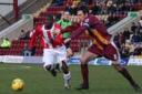 Suspension blow: Jo Kuffour in action against Bradford. He miss the next three games Gary Paul
