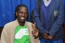 Inspirational story: Emmanuel Jal talks to a fan at the lanch of his new book Warchild