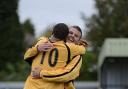 Happier times: Leon McDowell (10) celebrates his strike against Cove with Taylor Mollatt