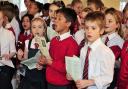 Children sing at the care home in Ewell