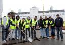 Ahmadiyya Muslim Youth Association help sweep snow in Morden