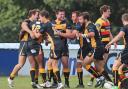 Good times: Esher celebrate Jay Udo-Udoma's try on the stroke of half-time