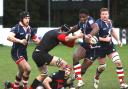 Defeat: Rosslyn Park's Joe Ajuwa struggles to break free of the Blackheath defence           All pictures: David Whittam