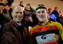 Honoured: Will Warden collected his 100th cap from Richmond president John Heaton on Saturday  Pictures: Brian Shatwell