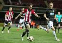 Battling back: Brentford midfielder Alan Judge