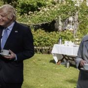 Jenny McGee with the prime minster at a Downing Street garden party last summer after helping treat him in hospital.