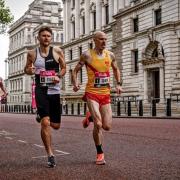 Hercules Wimbledon’s  Richard McDowell, Vitality Westminster Mile, and Tom Jervis with Eilish McColgan in the vitality 10km