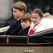 Prince Louis joined his siblings and parents on the balcony at Buckingham Palace today