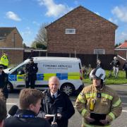 Metropolitan Police Chief Superintendent Sean Wilson with London Fire Brigade's Jonathan Smith speaking to the media at the scene following a house fire in Channel Close