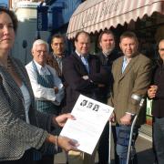 Coun Oonagh Moulton with unhappy traders when free parking was cut to 10 minutes