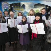 Allianz Global Assistance choir sang outside Croydon Visitor's Centre