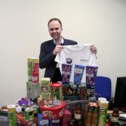 Croydon Central MP Gavin Barwell with the first week's worth of food donations