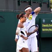 On the inside: Ross Hutchins with Heather Watson during the mixed doubles last year