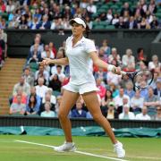 Laura Robson powers a forehand during her straight sets victory