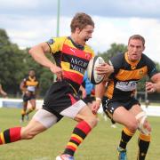 Happy times: Esher celebrate a Jay Udo-Udoma try in the 28-22 win at neighbours Richmond          SP79128