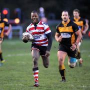 Key score: Rosslyn Park’s Dave Vincent, left, slices through a gap in the Esher defence to score the decisive try in a 38-31 triumph