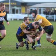 Squeezed: Patrick O’Grady is halted by the Worthing defence as hooker Neil Sweeney moves in to support during Esher’s 36-19 win on Saturday 	Deadlinepix SP82768