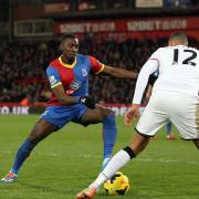 Pocketing the points: Yannick Bolasie and team-mate Jason Puncheon gave the Chelsea defenders a torrid time on Saturday