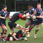 Defeat: Rosslyn Park's Joe Ajuwa struggles to break free of the Blackheath defence           All pictures: David Whittam