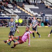 On target: Carl Wilson-Denis fires home for Corinthian Casuals at Imperial Fields on Saturday
