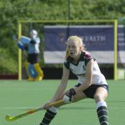 Injured: Surbiton's Charlotte Calnan suffered a nasty ankle injury in Sunday's cup shock