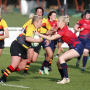 On the charge: Former England Women international Amy Turner carries the ball up for Richmond Ladies