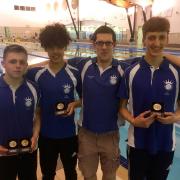 Medal charge: (from left to right) Dylan Conway, Blu Edmunds, coach Damien Bryan and Filip Blazevic