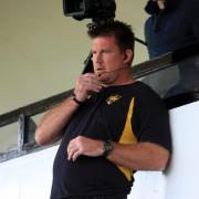 No more: Mike Schmid in familiar pose watching over an Esher match in 2014