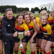 Happy days: Richmond fly half and vice captain Jackie Shiels, centre with trophy, and her team-mates celebrate claiming the Women's Senior Cup