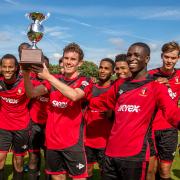 Champion start: Hayes & Yeading United got an early taste of lifting silverware at the Geoff Harvey & Jimmy Hill Memorial tournament at Corinthian Casuals on Sunday  All pictures: Stuart Tree