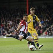Thinking positively: Nico Yennaris scored Brentford's first goal of the new Championship season