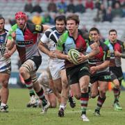 On the prowl: Sam Smith makes a break in Harlequins' 31-23 LV= Cup win over Bath in 2013