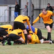 Happy days: Banstead Athletic get involved in a bundle