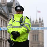 A police officer near Westminster where a terrorist carried out a savage attack on Wednesday, March 22