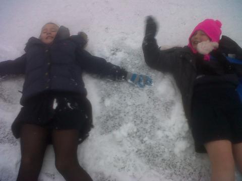Charlotte Fry and Jodie Fraser enjoy the snow - picture sent in by Mary Burstow