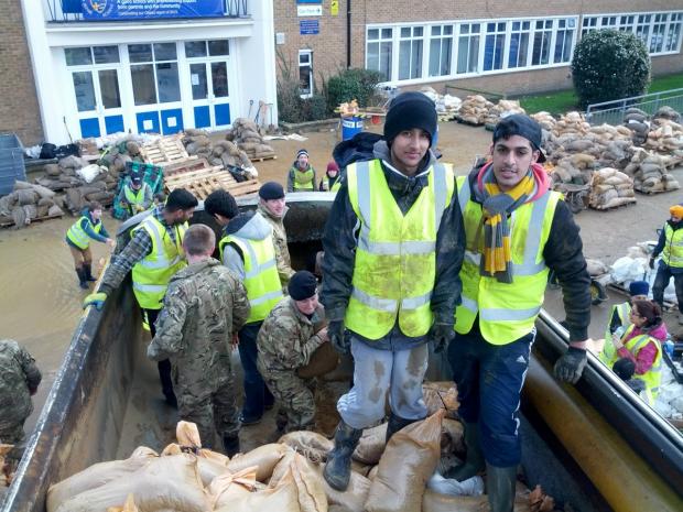 Your Local Guardian: Zafar Ahmad preparing sandbags to help flood stricken residents