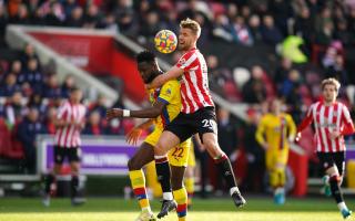 Crystal Palace's Odsonne Edouard (left) and Brentford's Kristoffer Ajer battle for the ball during the Premier League match at the Brentford Community Stadium, London.