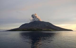 An eruption of Mount Ruang in the Sulawesi island, Indonesia, on Friday (National Search and Rescue Agency via AP)