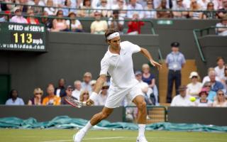In his way: Former world number one Roger Federer stands between Marcus Willis and a place in the third round at the Wimbledon Championships