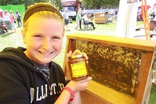 Bees: Amelia Miller, 11, at the honey pot demonstration