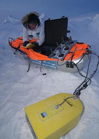 Pen Hadow tests SPRITE, the radar system used by the team to measure the thickness of the ice. Picture: Martin Hartley
