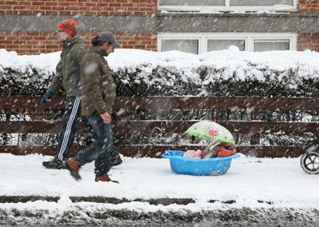 Streatham residents flocked to the common to try their skills at all manner of snow sports. Picture: Niall O'Mara