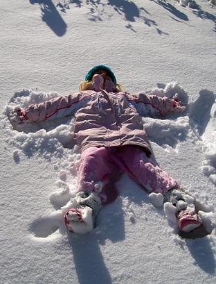 Snow angel Georgia Upton, photographed by her taken by mum Jamie from Sutton