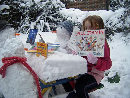 My daughter, Ellie, 5, and her snowmen reading books, just another day at school really! Sent in by Samantha Brown from New Malden